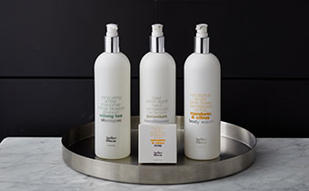 large bottles of Atelier Bloem bath amenities