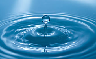 a closeup of a drop of water